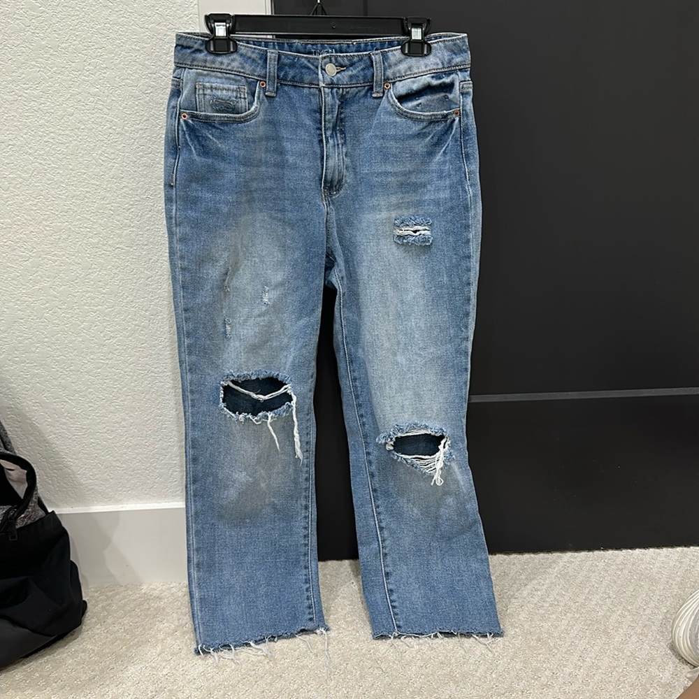 Frayed bottom distressed denim boutique jeans
